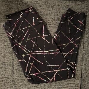 ZYIA Active Black Leggings with metallic abstract Design